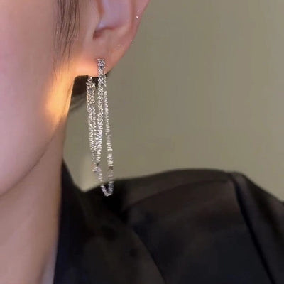 Dreifache Quasten-Ohrringe