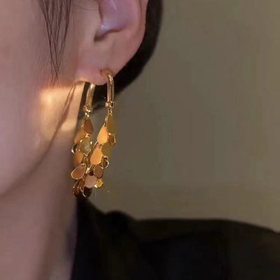 Pailletten-Ohrringe mit Quasten