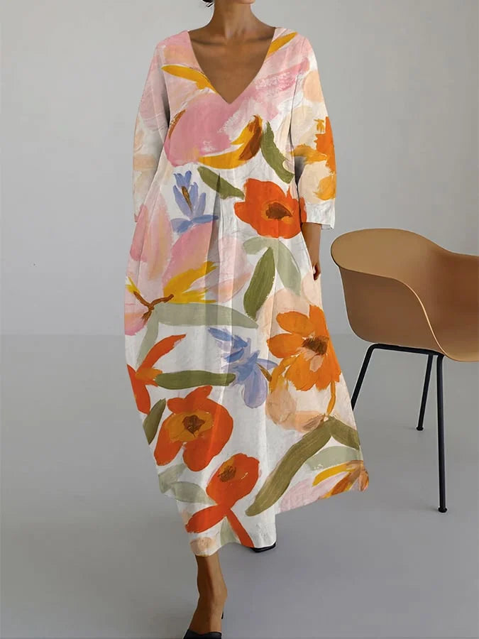 ISLA | KLEID MIT V-AUSSCHNITT UND BLUMENDRUCK