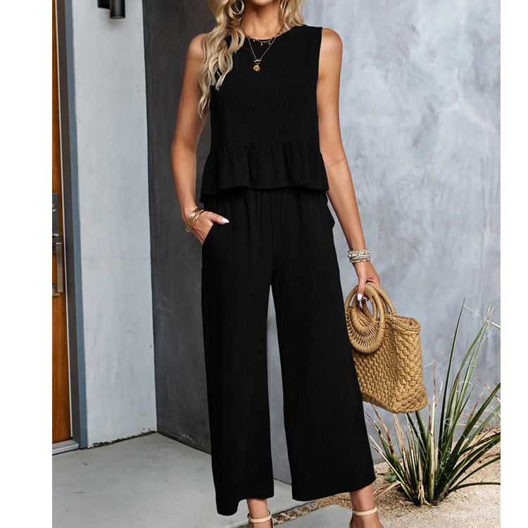 Celeste - Ärmelloser Jumpsuit mit weitem Bein und Rüschen