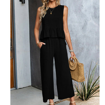 Celeste - Ärmelloser Jumpsuit mit weitem Bein und Rüschen