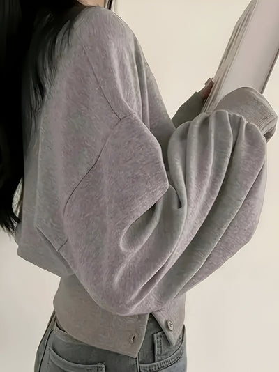 Gudrun | Lässiger Luxus: Elegantes T-Shirt in Uni-Farbe mit Knopfdetail