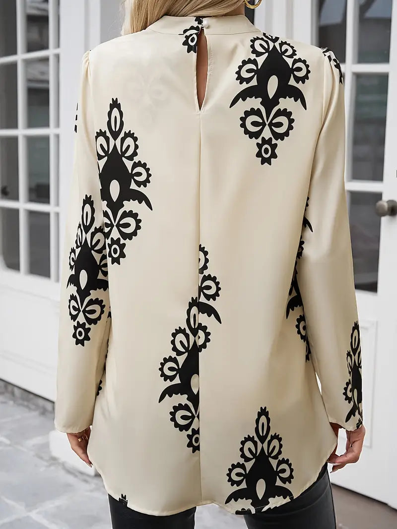 Veloria – Schicke, hochgeschlossene Longline-Bluse mit kunstvollem Print