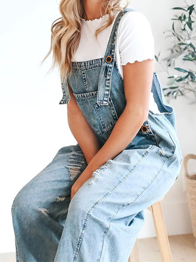 Weite Latzhose aus Jeans | Used-Effekt | Lässiger Vintage-Stil